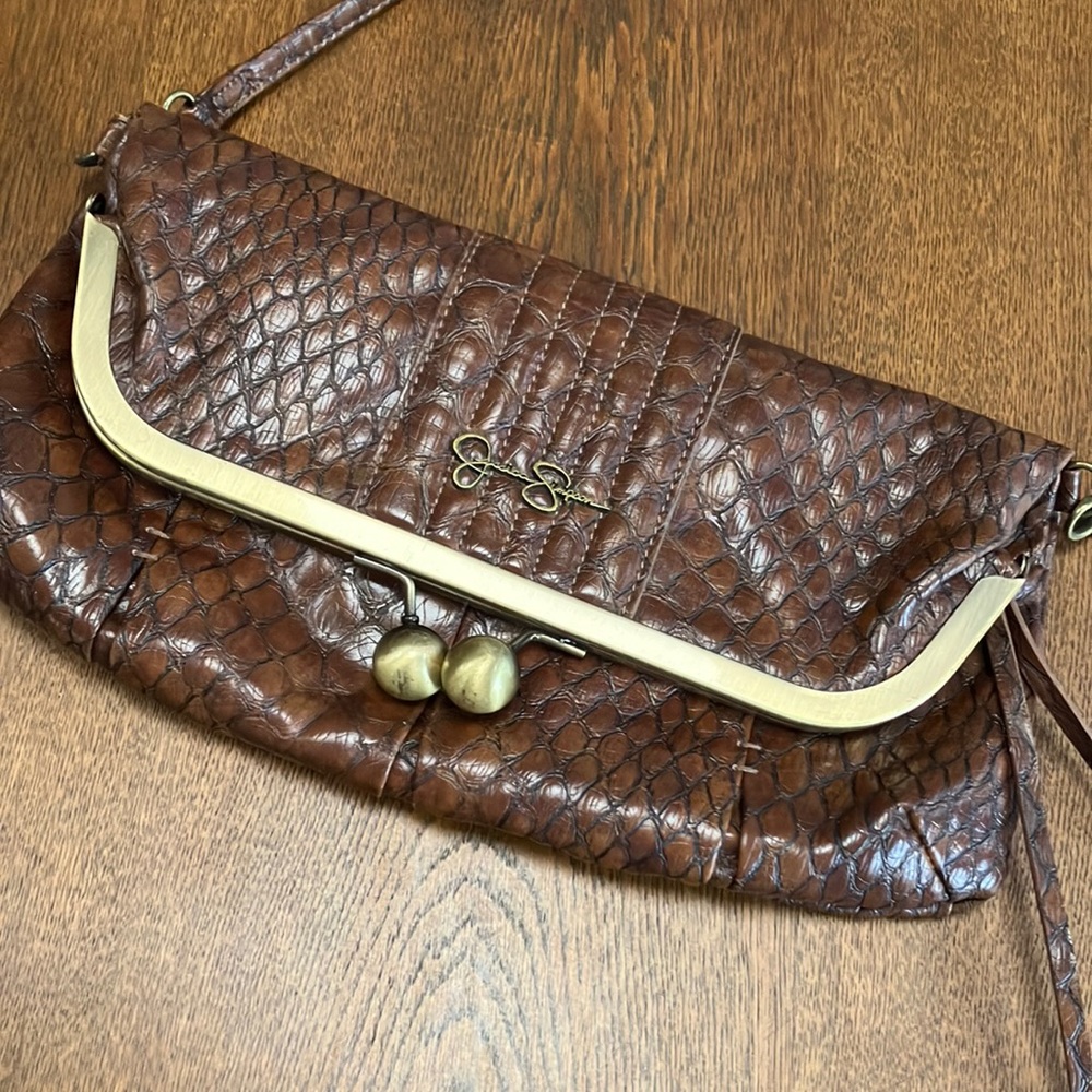 Jessica Simpson fold over Tiffany KissLock bag. Brown, excellent condition.
